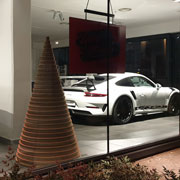 Alberi di Natale in cartone by Lessmore, Design Giorgio Caporaso per l'autosalone Porsche a Varese. Natale Green ed ecosostenibile